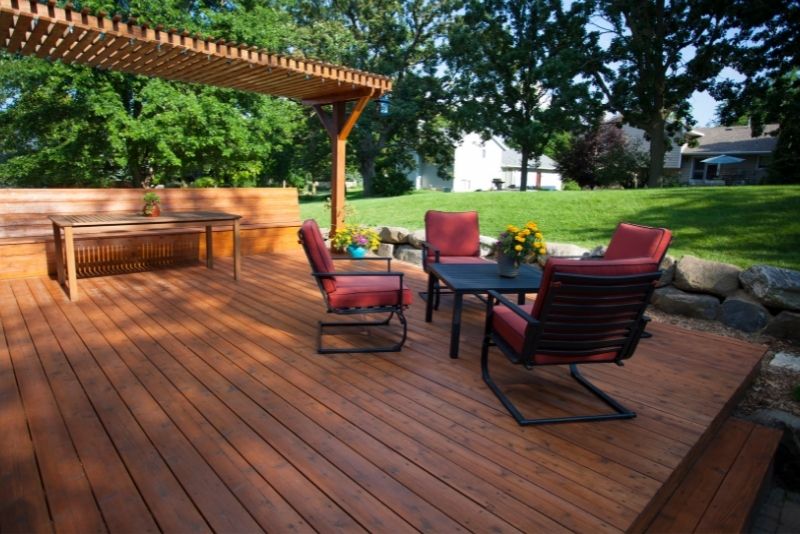 A wooden pergola and deck