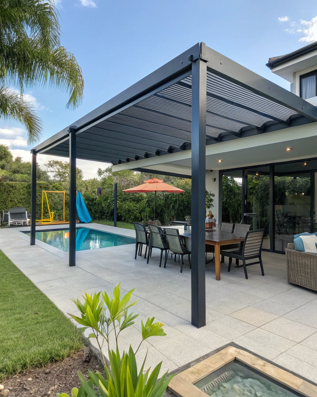 Modern aluminium pergola covering a backyard pool deck